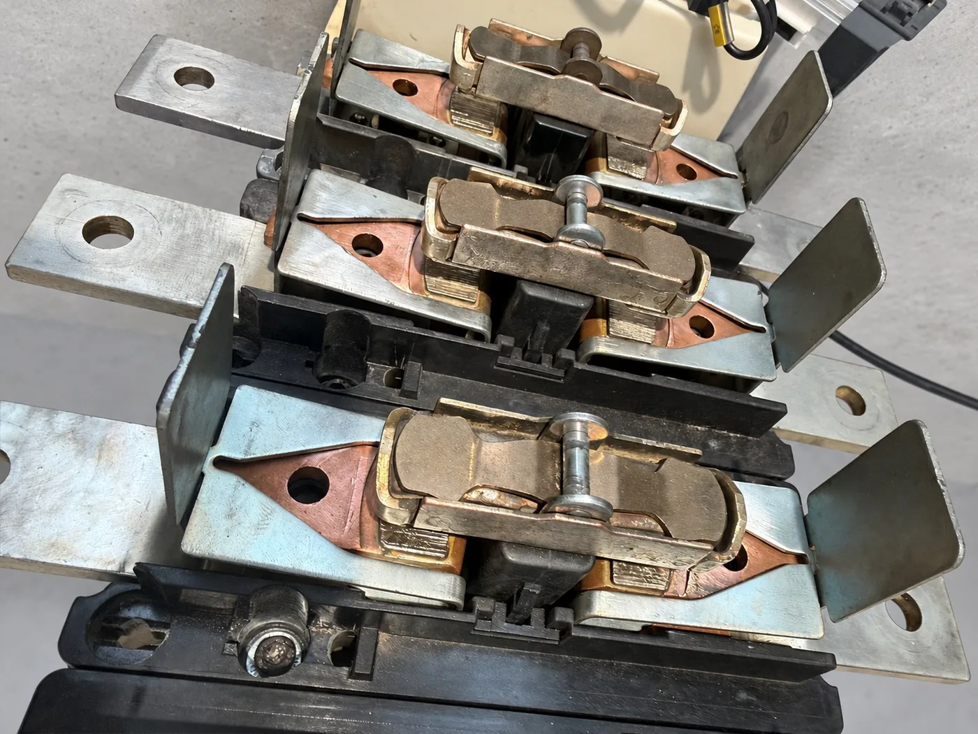 Close view of the restored LC1F780 contacts: separated, dressed and re-plated